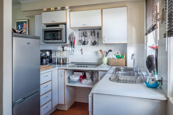 How Can You Optimize Kitchen Storage with Clever Cabinet Organizers?